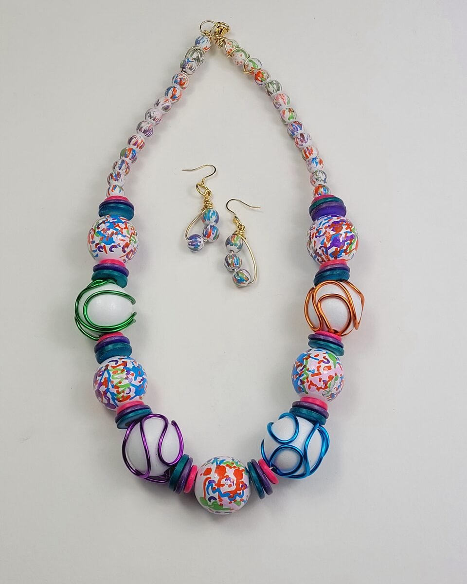 Confetti rainbow beaded necklace with wire-wrap accents.