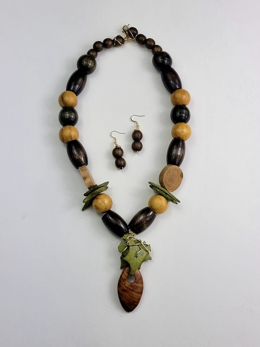 Wood beaded necklace with an olive stone pendant.