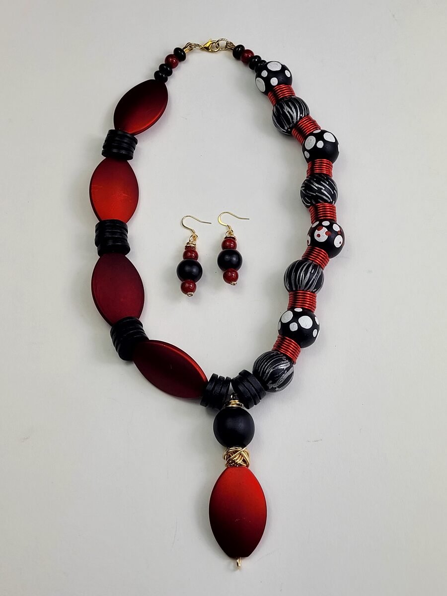 Red, black, and white striped beaded necklace.