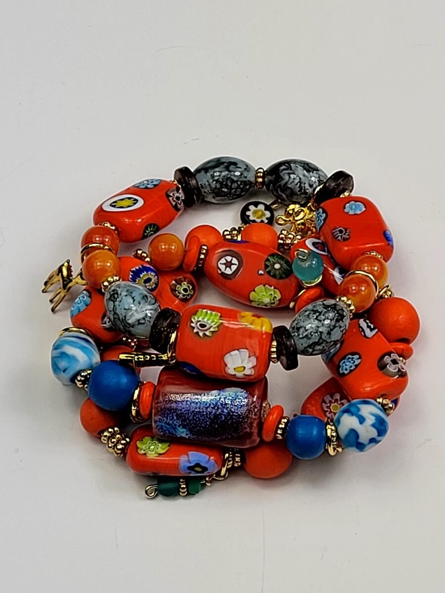 Orange and black floral-pattern beaded bracelet.
